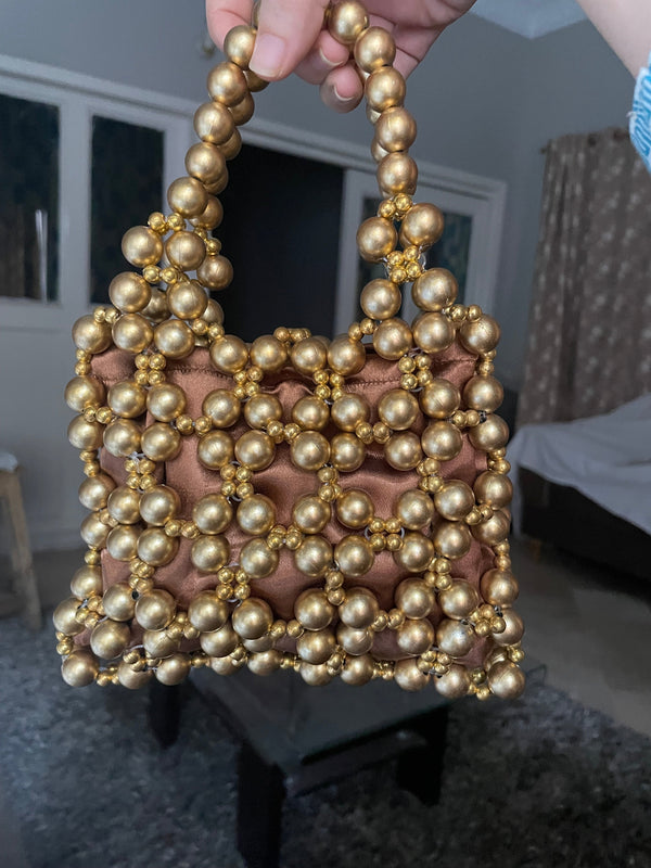 Golden beaded bag
